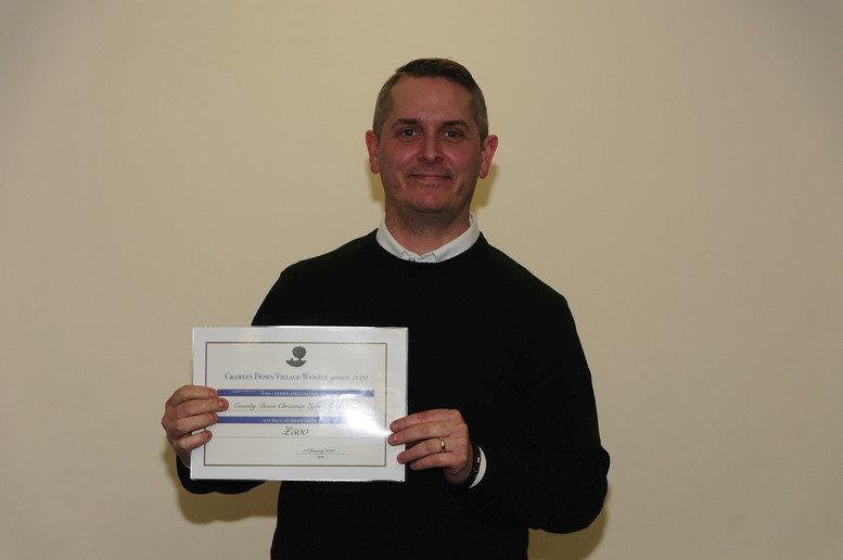 Mike Lavender of Crawley Down Christmas Lights Association - Â£500